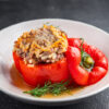 stuffed pepper meat and rice filling fresh food tasty healthy eating cooking appetizer meal food snack on the table copy space food background rustic top view