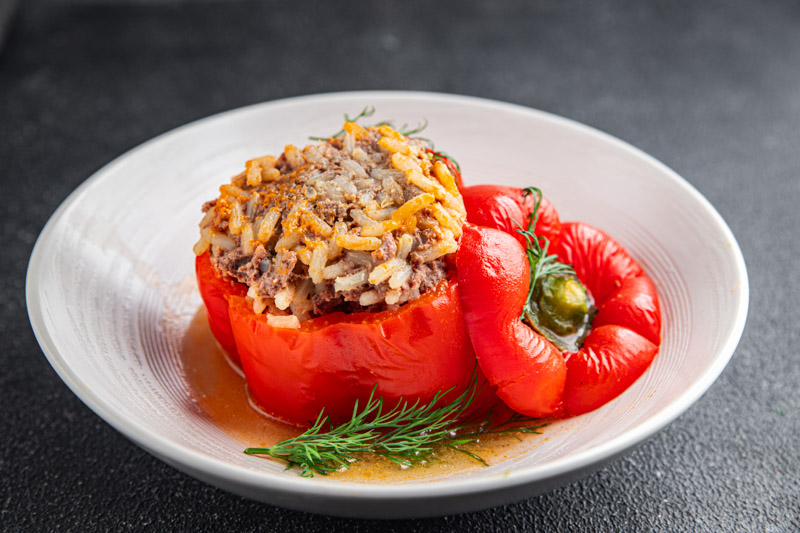 stuffed pepper meat and rice filling fresh food tasty healthy eating cooking appetizer meal food snack on the table copy space food background rustic top view